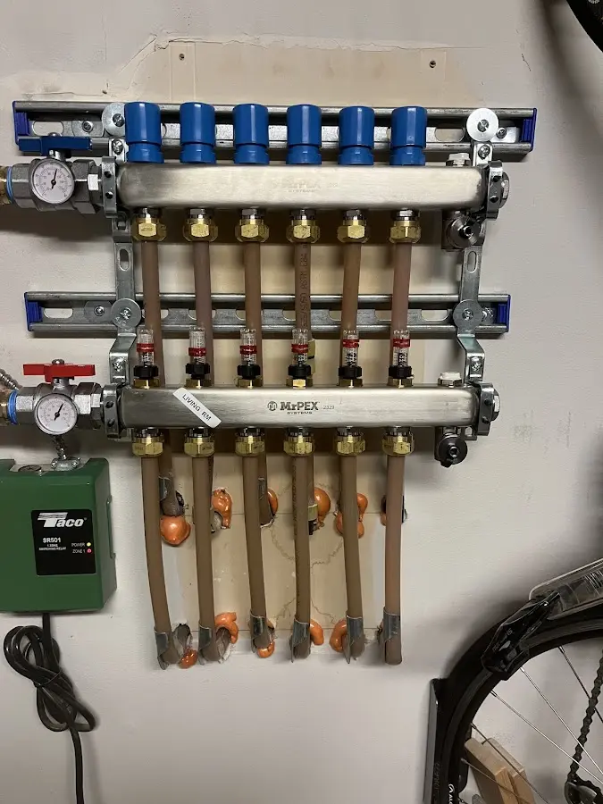 Plumber performing Gas Leak Detection at a residential property in Oak Creek